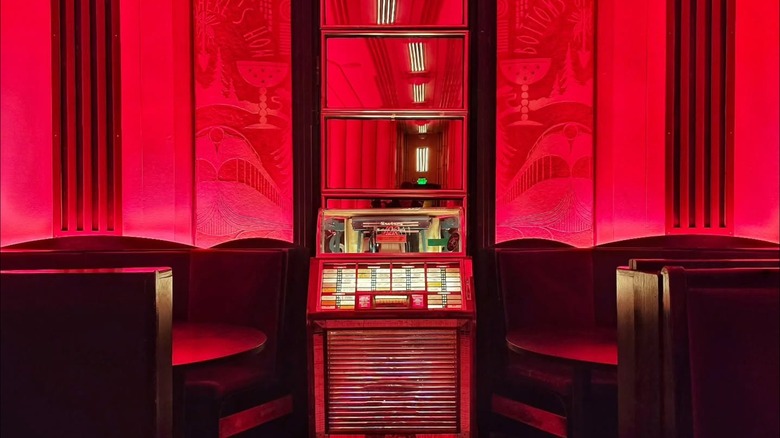 Chairs and jukebox in the red Cruise Room in The Oxford in Denver, Colorado