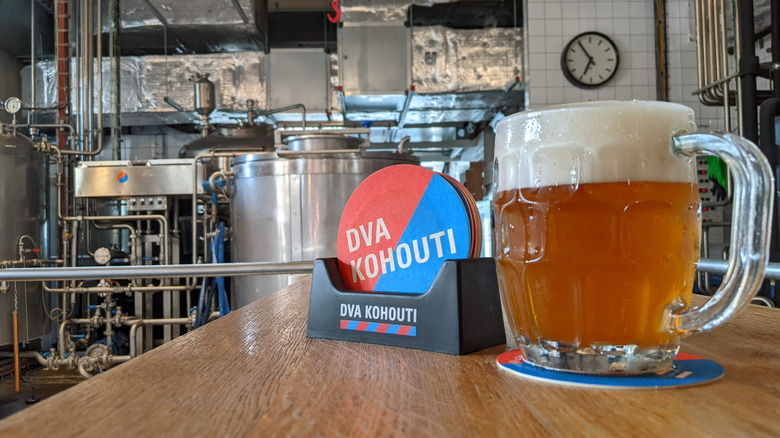 Glass of beer at the Dva Kohouti brewery in Prague