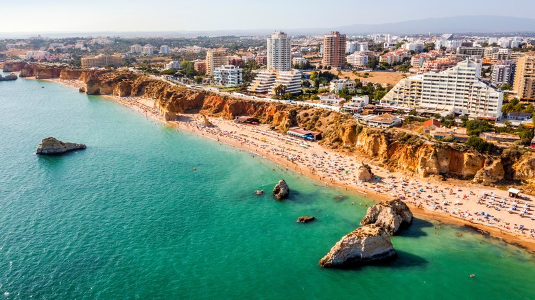 A busy beach in Portimão