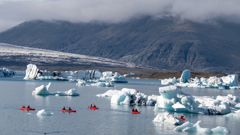 Kayakers explore Jökulsárlón lake
