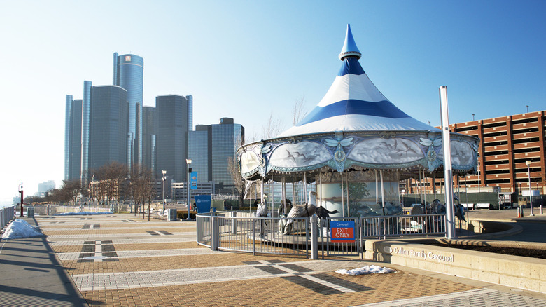 Carousel at Cullen Plaza on the Riverwalk, with downtown Detroit skyscrapers behind