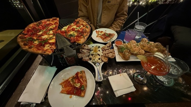 Pizza, appetizers, and cocktails at Mootz Pizzeria + Bar in Detroit