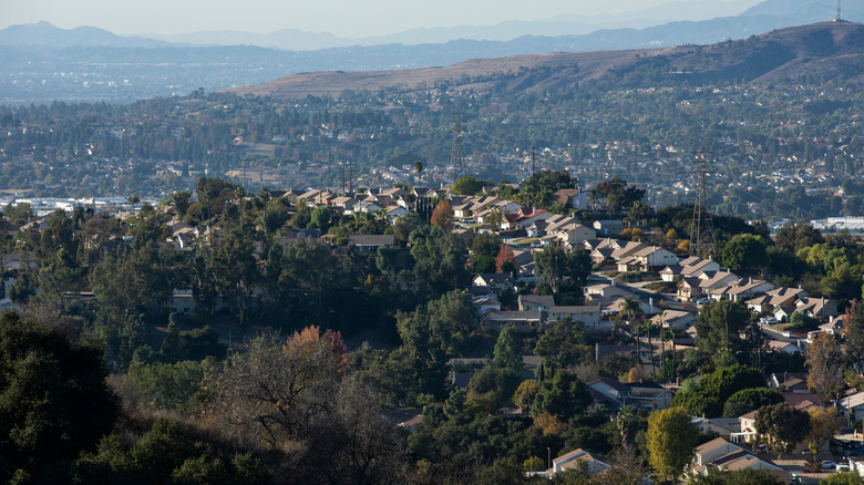 Diamond Bar, California with houses on a hill and mountains in background