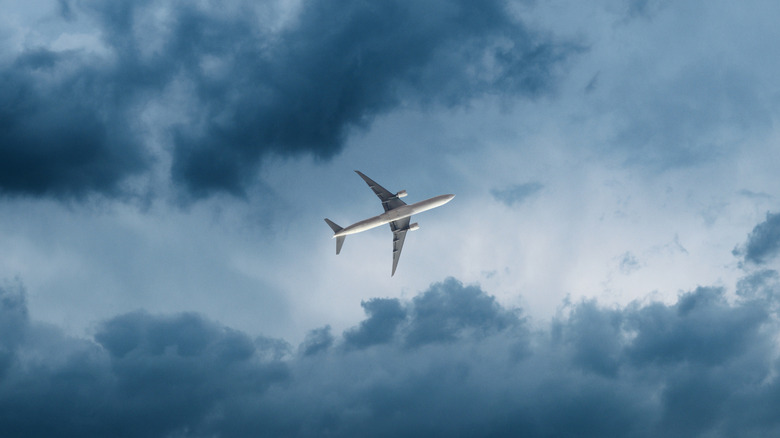 A plane flying through bad weather