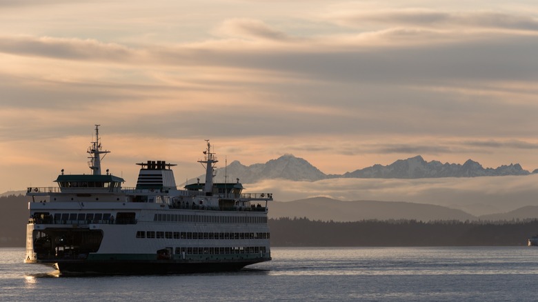 A ferry crossing at sunset