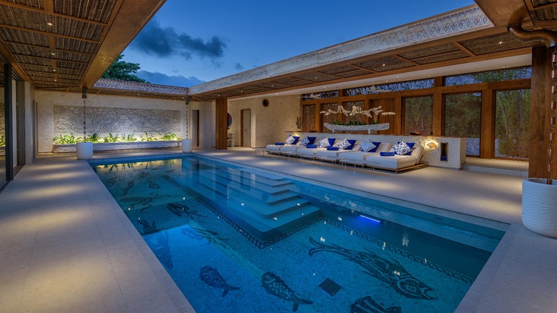 Foyer with sparkling blue pool in the new Couryard Residences villa at Wakatobi Dive Resort