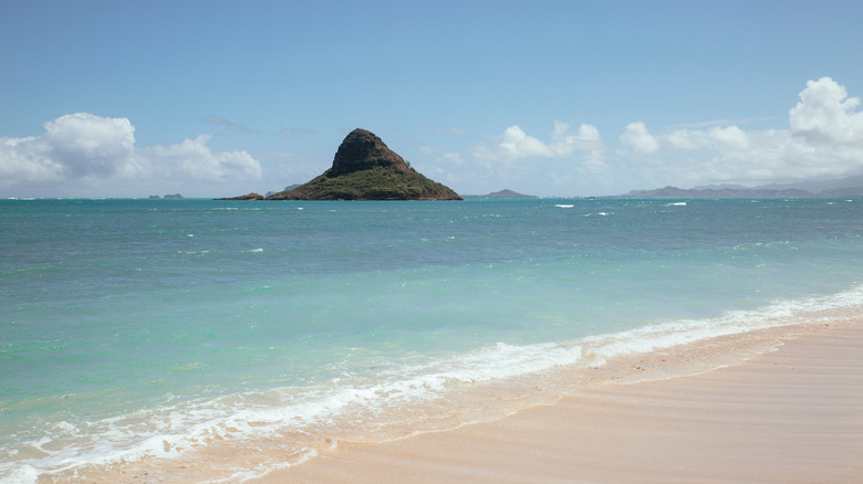 View of the island of Mokoli'i from the beach in Oahu, Hawaii