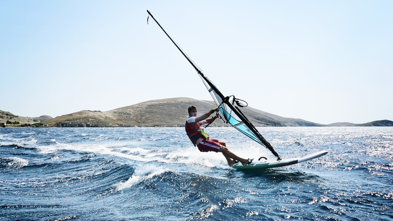 Wind surfer off the coast of Agios Georgios, Greece