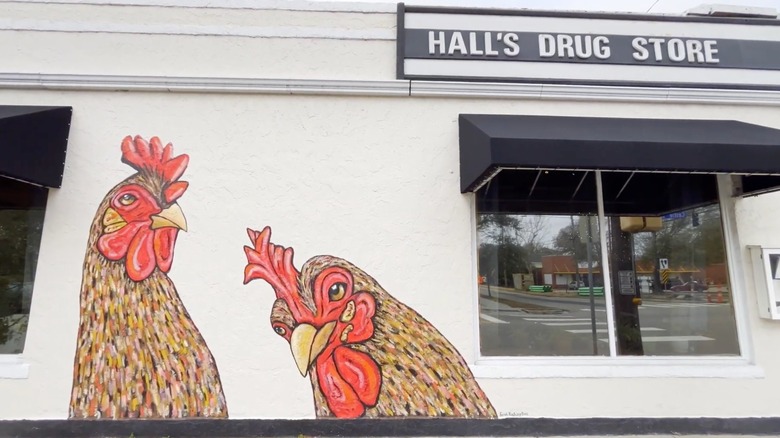 Chicken mural on the wall of Rx Chicken & Oysters in Castle Street Arts District in Wilmington, North Carolina