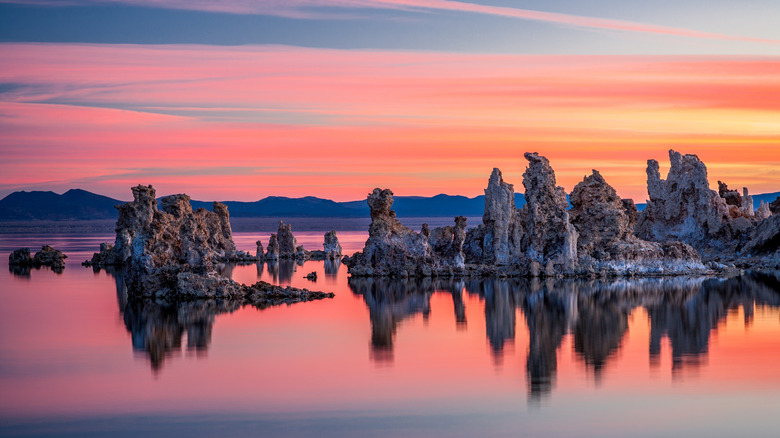 Tufa formations at Mono Lake under an orange sky