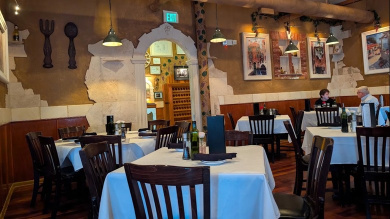 The dining room with diners in the background at Basil Tree Ristorante in Dixon, Illinois