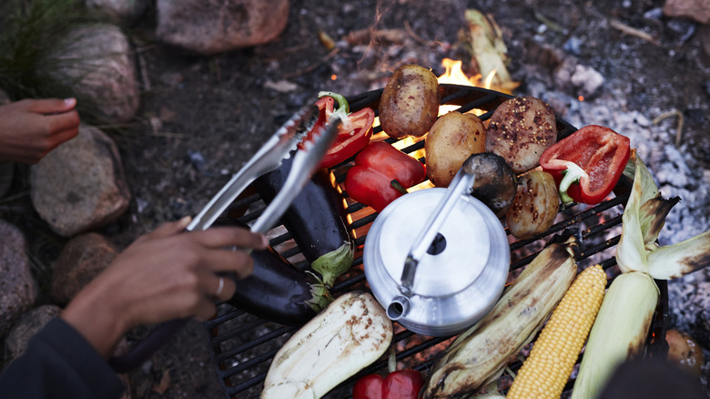 Cooking veggies over an outdoor grill