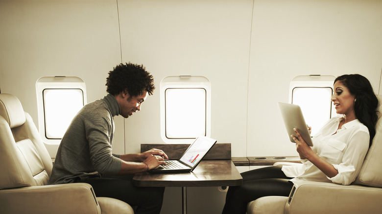 Couple on a private jet