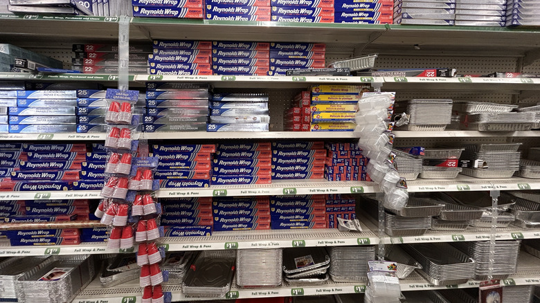 An aisle full of aluminum foil and aluminum cookware at Dollar Tree