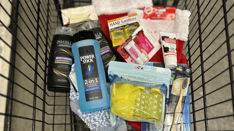 A cart stocked with camper-friendly stocking stuffers, and stockings, at Dollar Tree