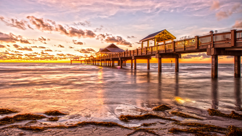 A colorful sunset over the pier at Clearwater Beach, Florida on the Gulf Coast