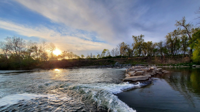 Eastwood lake at Eastwood MetroPark, near Downtown Dayton, Ohio, with trees on the shore