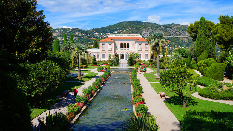 The famous Villa & Jardins Ephrussi de Rothschild with pink exterior in Saint-Jean-Cap-Ferrat, South of France