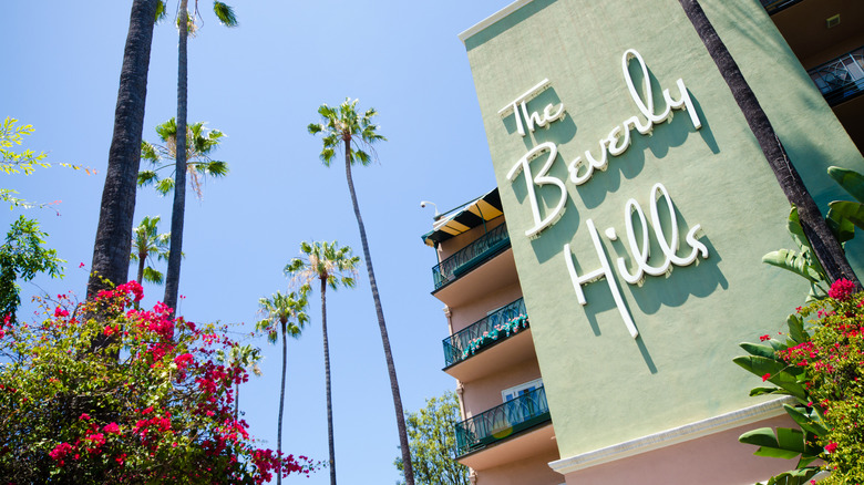 Beverly Hills Hotel sign with palm trees in California