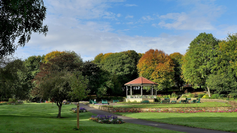 Pretty bandstand, surrounded by trees and gardens, at Elsecar Park in South Yorkshire