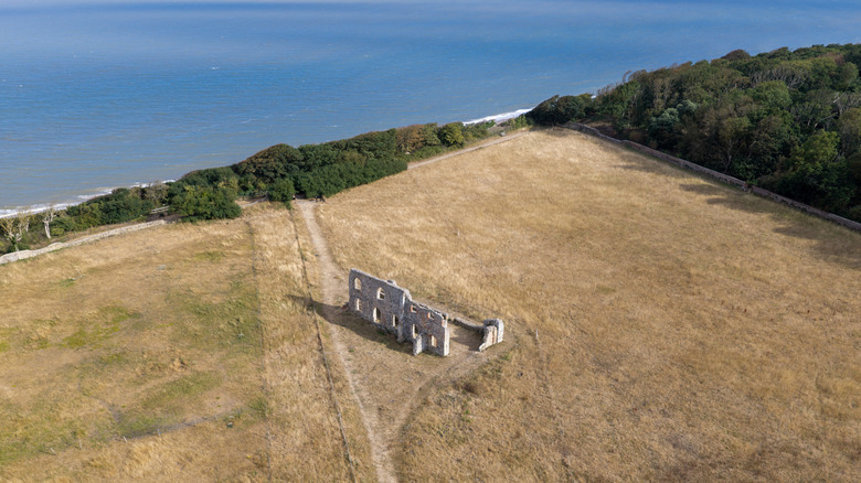Ancient stone ruins sit above the North Sea in Dunwich, England
