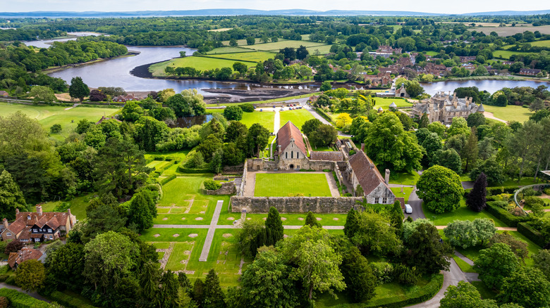Aerial view of Beaulieu Abbey and the surrounding village