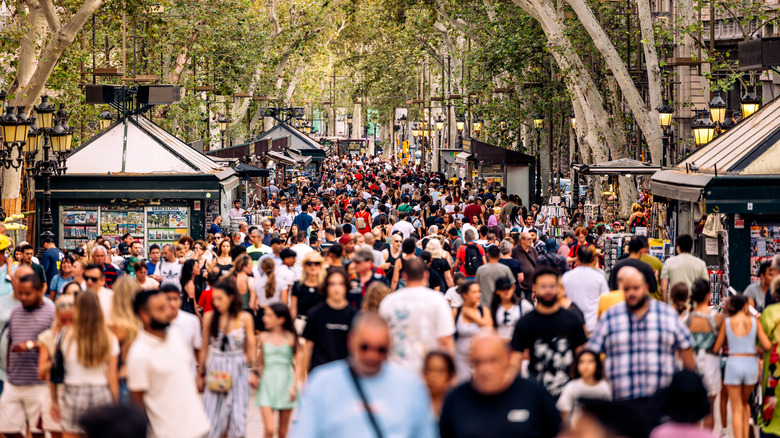 View of La Rambla in Barcelona, Spain, a popular pedestrian walkway that thousands of people pass through daily