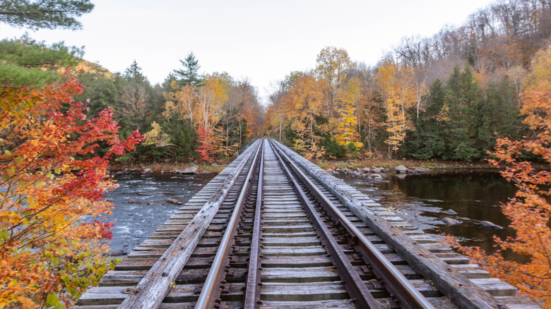 Train tracks running through the Adirondacks over the Hudson River