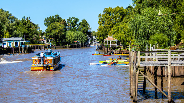boats and kayaks in the Tigre Delta on a sunny day