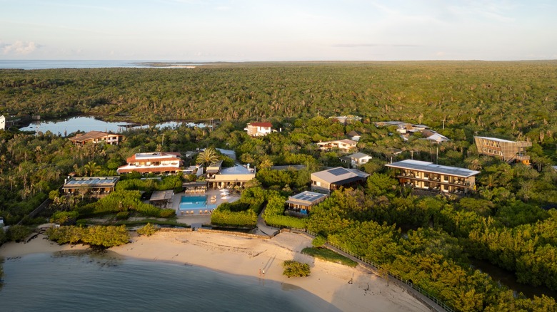 Aerial view of Finch Bay Galapagos Hotel and beach