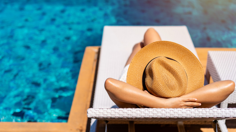 Woman on a sun lounger