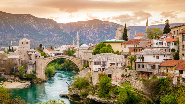 The Neretva River flowing under Stari Most in Mostar, Bosnia and Herzegovina
