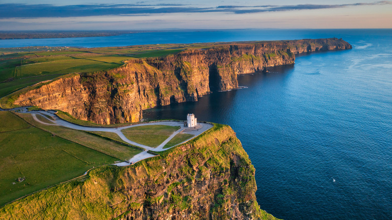 An aerial view of the Cliffs of Moher at sunset in Ireland