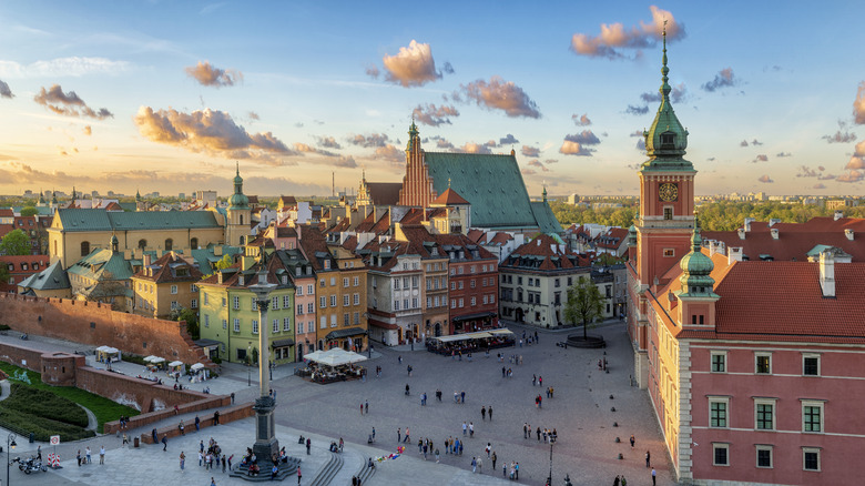 An aerial view of the historic center of Warsaw, Poland, at sunset