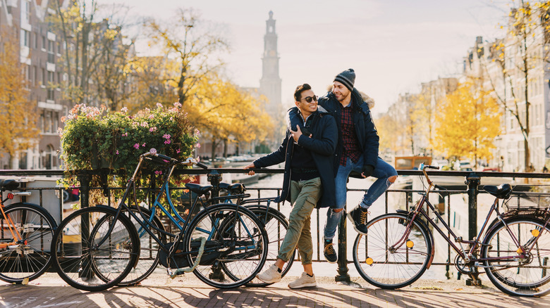 Gay couple with cycles in Amsterdam