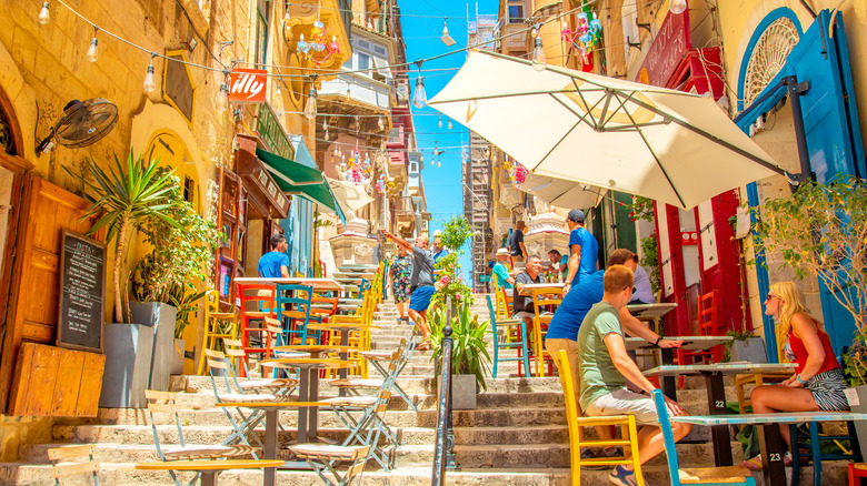 Colorful steps and furniture on a sunny day in Malta