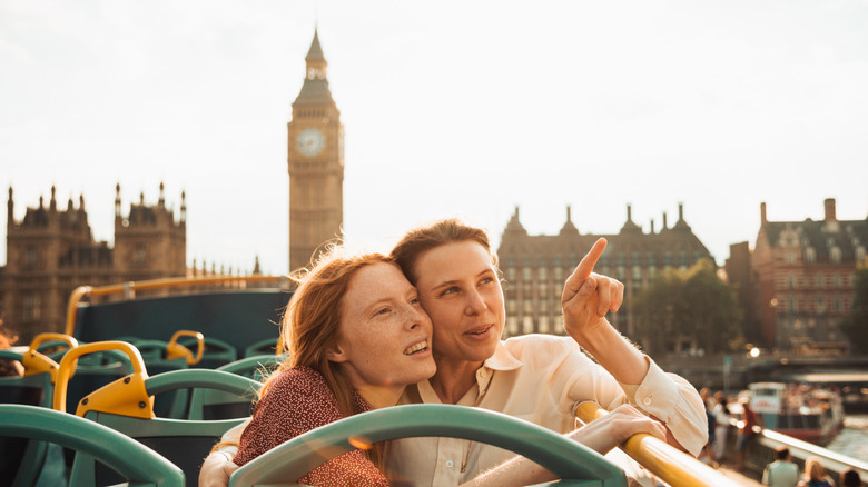 Lesbian couple on a tourist bus in England