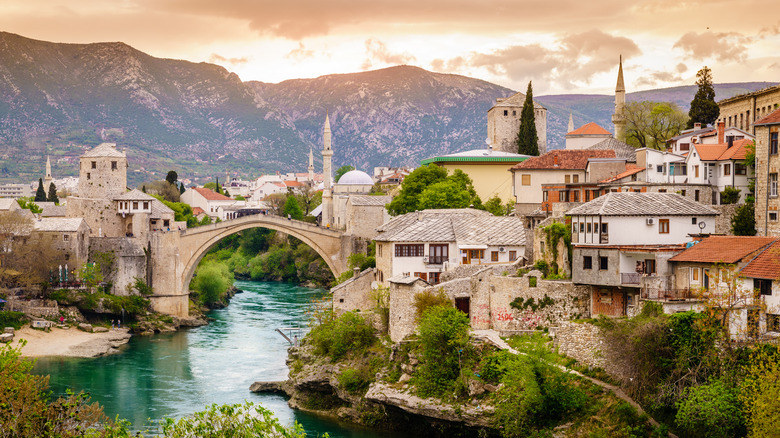 The Neretva River flowing under Stari Most in Mostar, Bosnia and Herzegovina