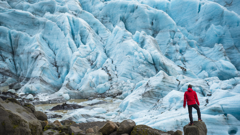 Hiker standing along Vatnajökull edge