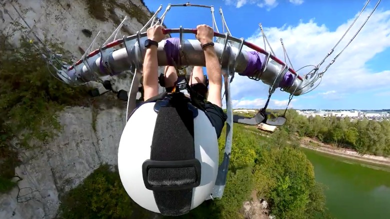 Person's view from the apex of a massive swing