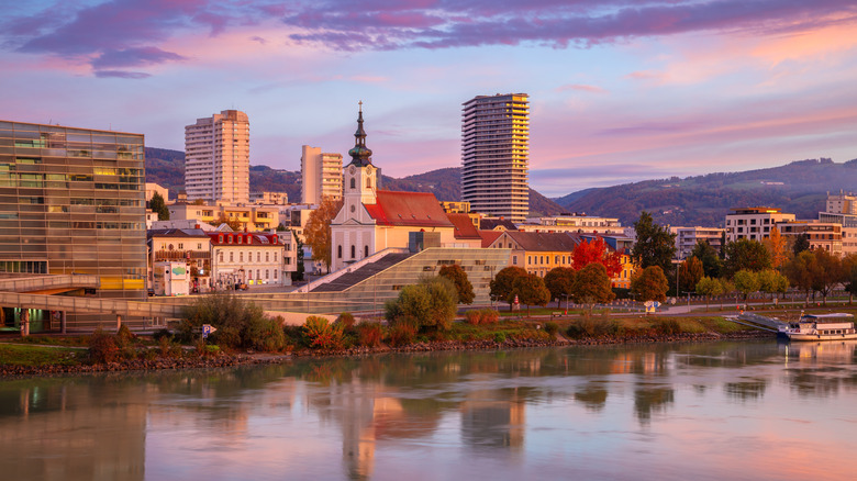 The city of Linz seen from the Danube River during sunset