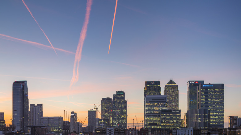 Contrails over Thames river in London