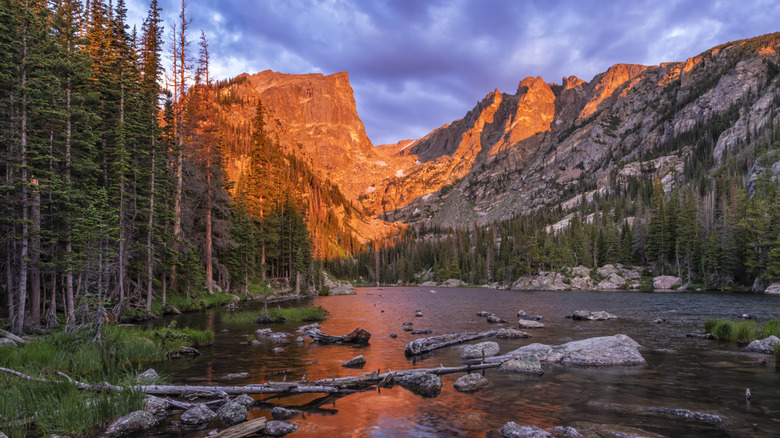 Morning Alpenglow on Hallett Peak and Flattop Mountain reflected in Dream Lake at sunrise in Rocky Mountain National Park, Estes Park, Colorado