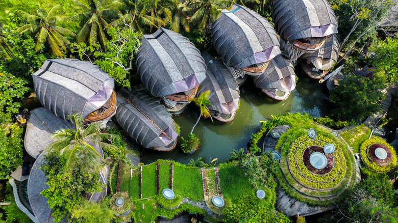 Aerial view of lush jungle surrounding the villas of Ulaman Eco Luxury Resort in Bali, Indonesia