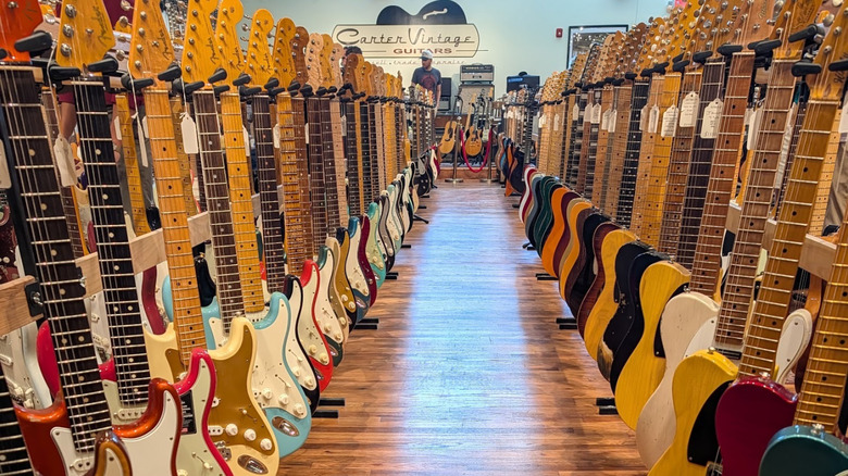 Rows of vintage guitars inside Carter's Vintage guitars in the Gulch neighborhood of Nashville