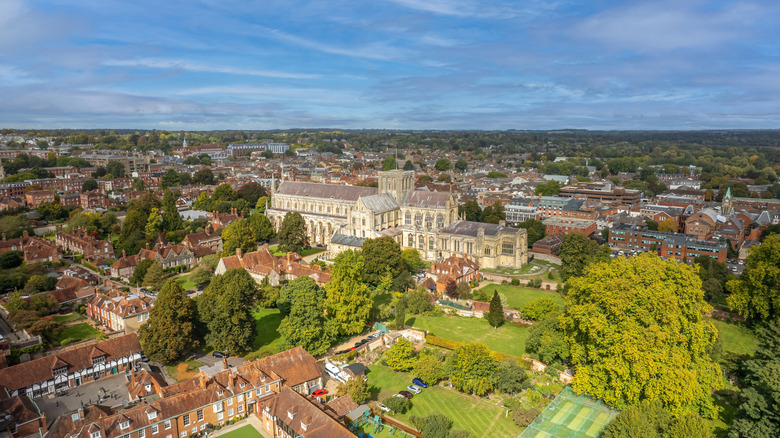 An aerial shot of Winchester cathedral, its grounds, and the surrounding buildings