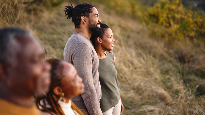 Multi-generational family enjoying nature views