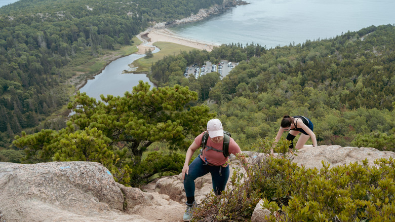 Two hikers at Acadia National Park in Maine