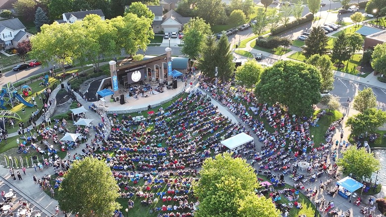 An aerial shot of a concert at the amphitheatre at Village Green Park