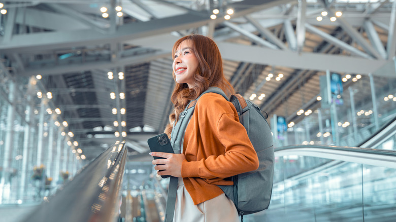 Smiling woman in airport